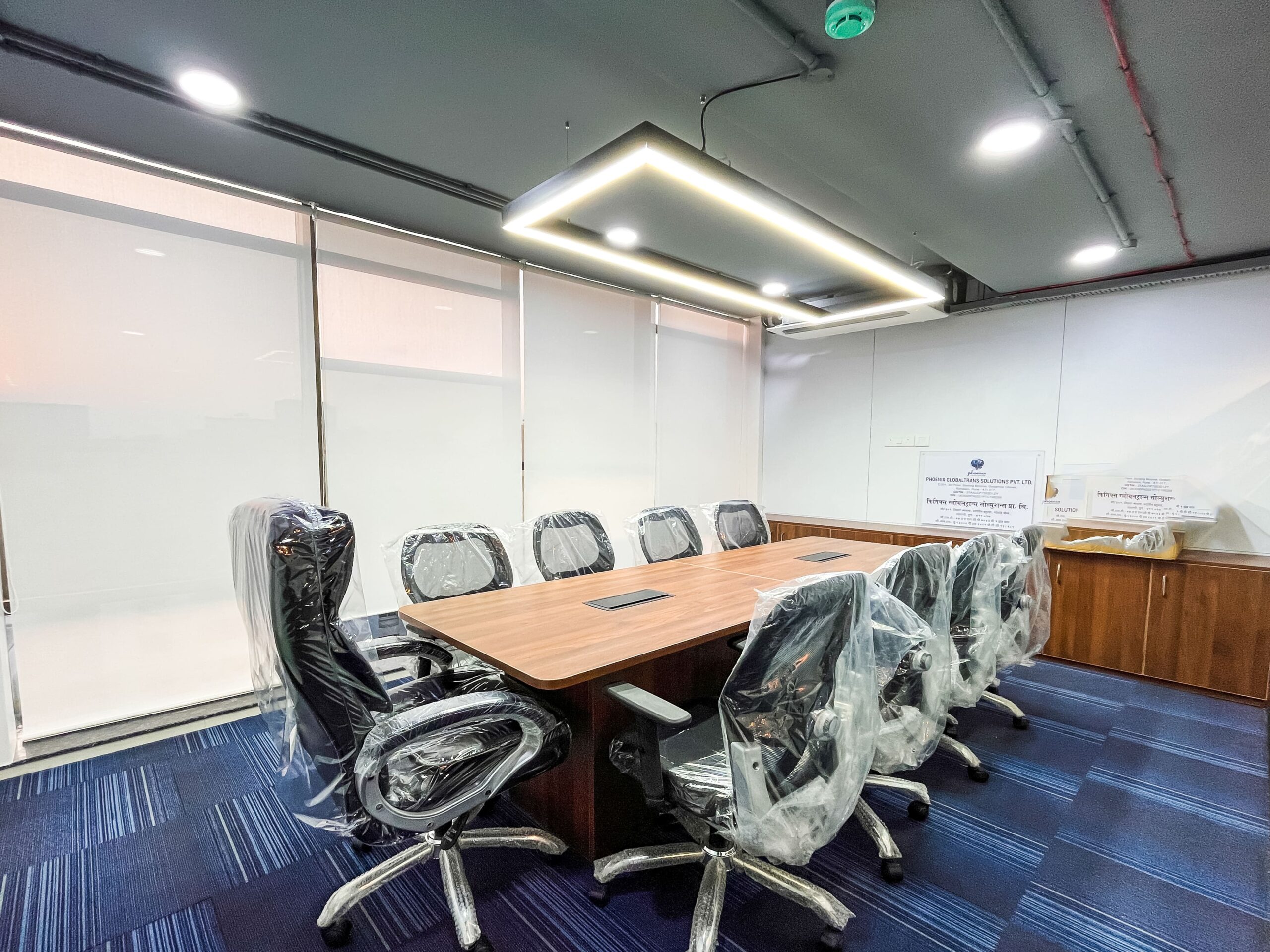 Conference room with large wooden table