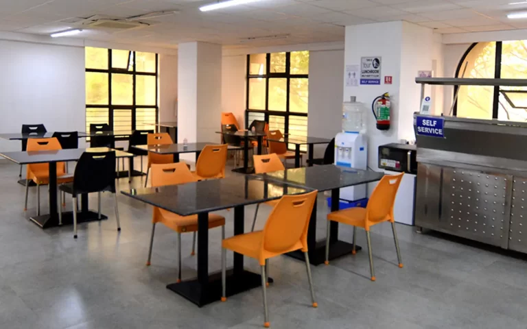 Office cafeteria featuring a variety of seating options