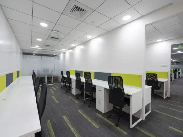 Modern office interior with desks and ergonomic chairs