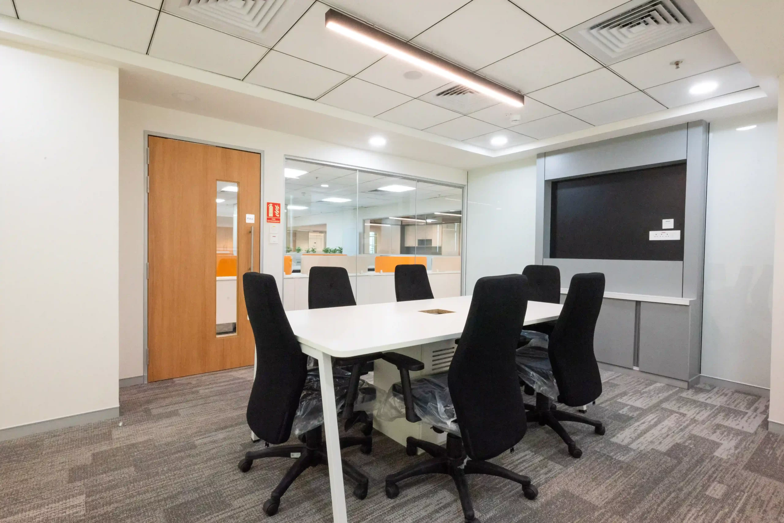 professional meeting room with desk & chairs